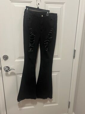 SHEIN Black Distressed Flare Jeans with Raw Hem
